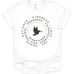 A white short-sleeve crewneck t-shirt with a circular graphic on the chest. The graphic features a black dove holding an olive branch, surrounded by the words 'FRUIT OF HOLY SPIRIT' in yellow and other virtues like patience, kindness, and love in black text.