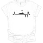 A white short-sleeve crewneck t-shirt with a black graphic print of a heartbeat EKG line forming a cross on a hill and surrounding a silhouette of a tomb.