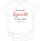 A white short-sleeve crewneck t-shirt with a printed religious quote on the front reading 'MY HEART Rejoiceth IN THE LORD 1 SAMUEL 2:1' in black and red lettering, shown against a plain white background.