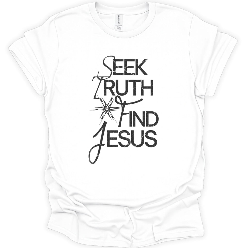 A white short-sleeve crewneck t-shirt with a black graphic print on the front reading 'SEEK TRUTH FIND JESUS' in a mix of serif and cursive fonts, displayed on a clean white background.