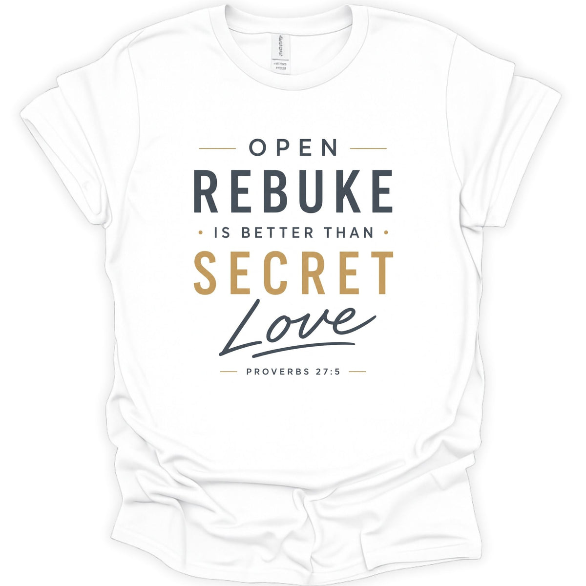 A white short-sleeve crewneck t-shirt with a printed graphic on the front. The text reads 'OPEN REBUKE IS BETTER THAN SECRET Love' with 'PROVERBS 27:5' underneath, using dark gray and gold typography.