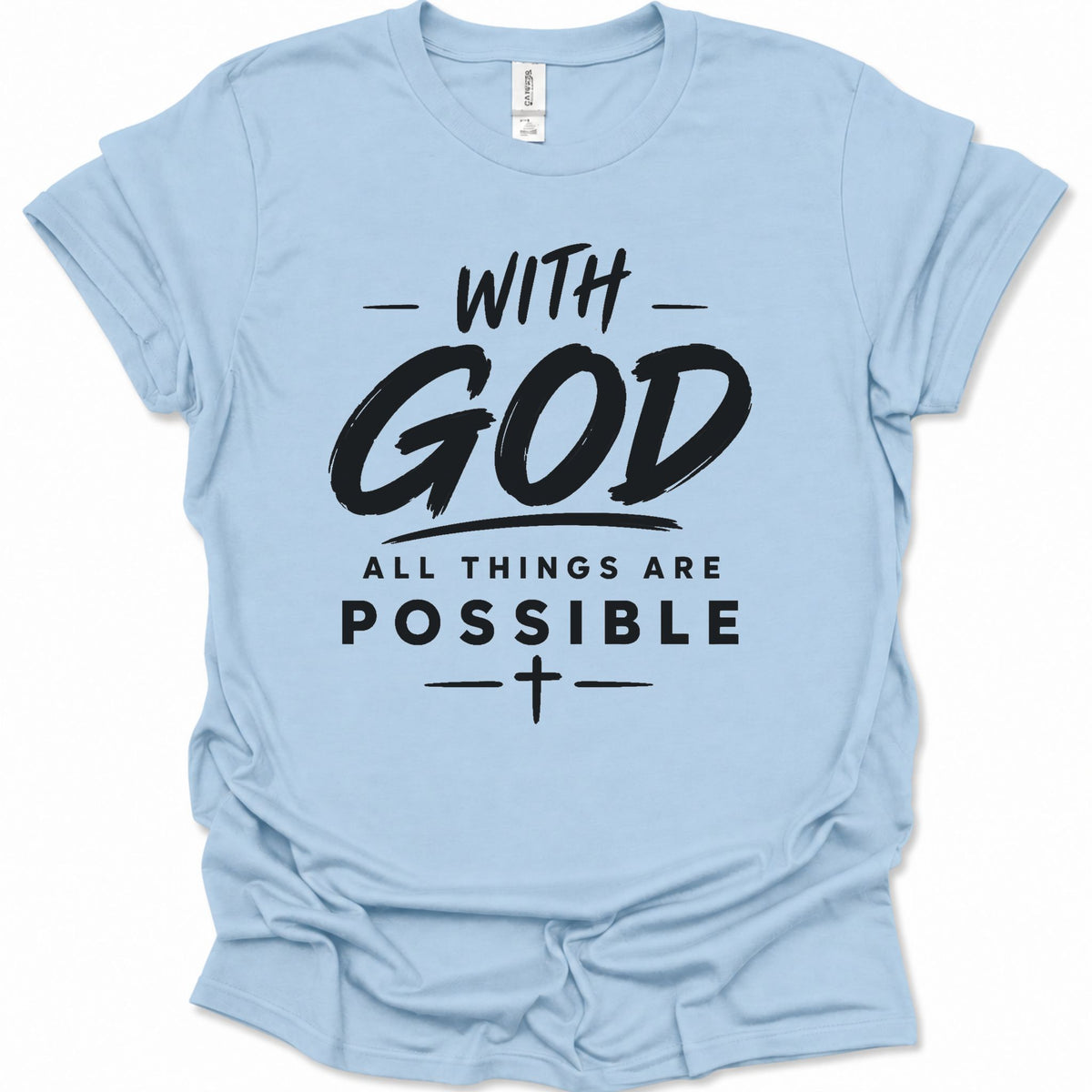A light blue short-sleeve crewneck t-shirt with a black graphic text print reading 'WITH GOD ALL THINGS ARE POSSIBLE' and a small cross symbol, shown on a plain white background.