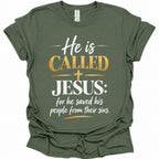 A military green short-sleeve t-shirt with a graphic text print on the front reading 'He is CALLED JESUS: for he saved his people from their sins.' in white and gold lettering, displayed on a clean white background.