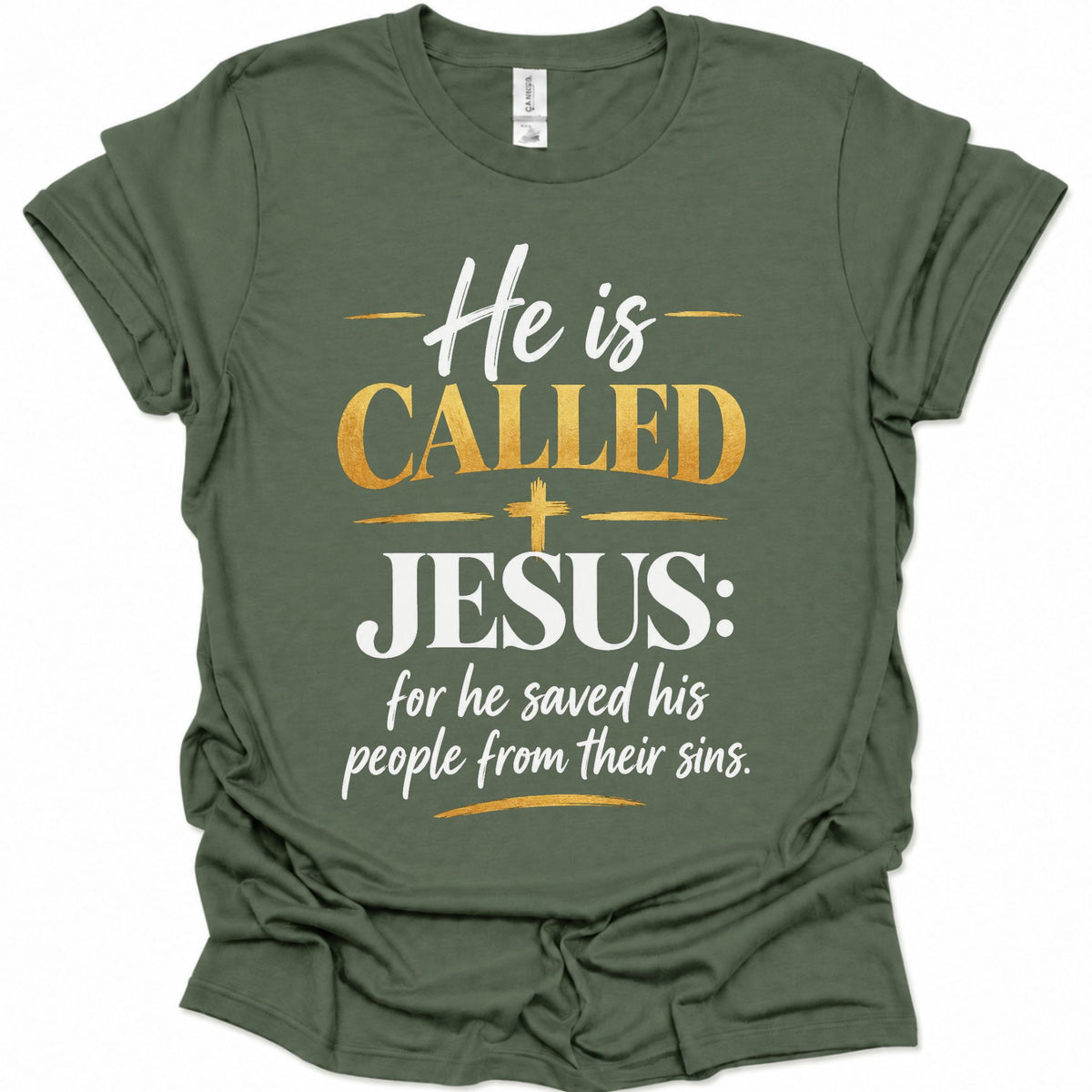 A military green short-sleeve t-shirt with a graphic text print on the front reading 'He is CALLED JESUS: for he saved his people from their sins.' in white and gold lettering, displayed on a clean white background.
