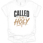 A white short-sleeve crewneck t-shirt with a graphic print on the front reading 'CALLED TO BE HOLY' in black and tan lettering, with a small cross below.
