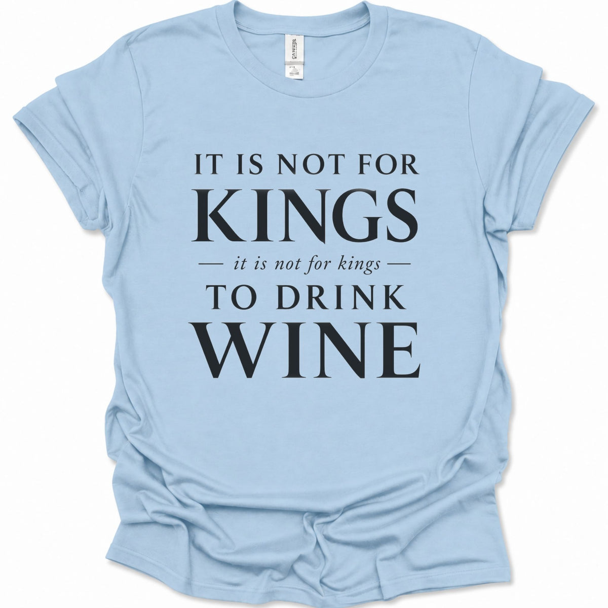 A light blue short-sleeve t-shirt with a black printed text graphic reading 'IT IS NOT FOR KINGS it is not for kings TO DRINK WINE' on a white background.