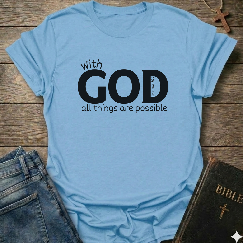 Light blue t-shirt with 'With GOD all things are possible' Matthew 19:26 bold faith apparel conversation starter
text on a wooden surface with jeans and a Bible.