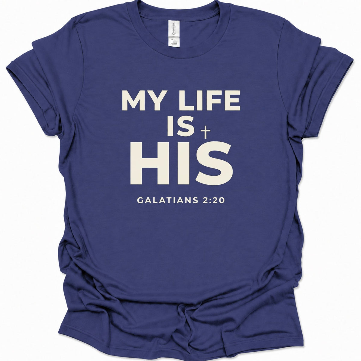 A purple blue short-sleeve t-shirt with white printed text reading 'MY LIFE IS HIS' and 'GALATIANS 2:20' on the front, shown on a plain white background.