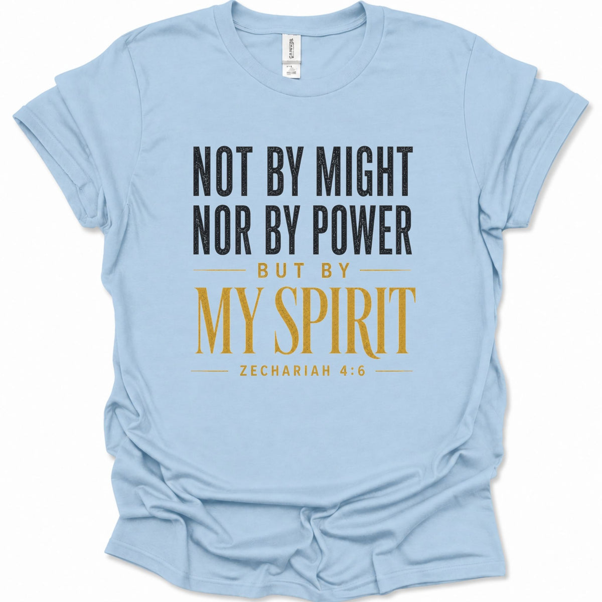 A light blue short-sleeve t-shirt with a printed text graphic on the front reading 'NOT BY MIGHT NOR BY POWER BUT BY MY SPIRIT ZECHARIAH 4:6' in black and gold lettering, displayed on a clean white background.