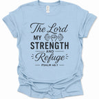 A light blue short-sleeve crewneck t-shirt with a black graphic print on the front reading 'The Lord My Strength and Refuge Psalm 46:1' with a barbell and fist illustration, shown on a white background.