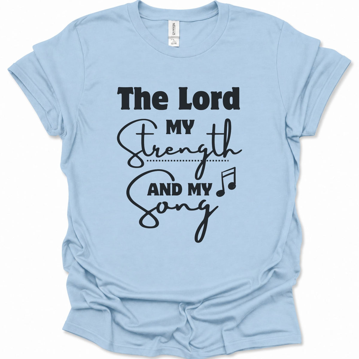A light blue short-sleeve t-shirt with a black graphic text print reading 'The Lord My Strength And My Song' on the front, displayed flat against a white background.