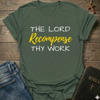 Military Green t-shirt with "The Lord Recompense Thy Work" Ruth 2:12 black gold text faith apparel Faith Forward on a wooden surface with jeans and a Bible.