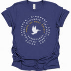 A purple short-sleeve t-shirt with a circular graphic on the chest featuring a white dove and the words 'FRUIT OF HOLY SPIRIT' in yellow, surrounded by white words including patience, kindness, and love.