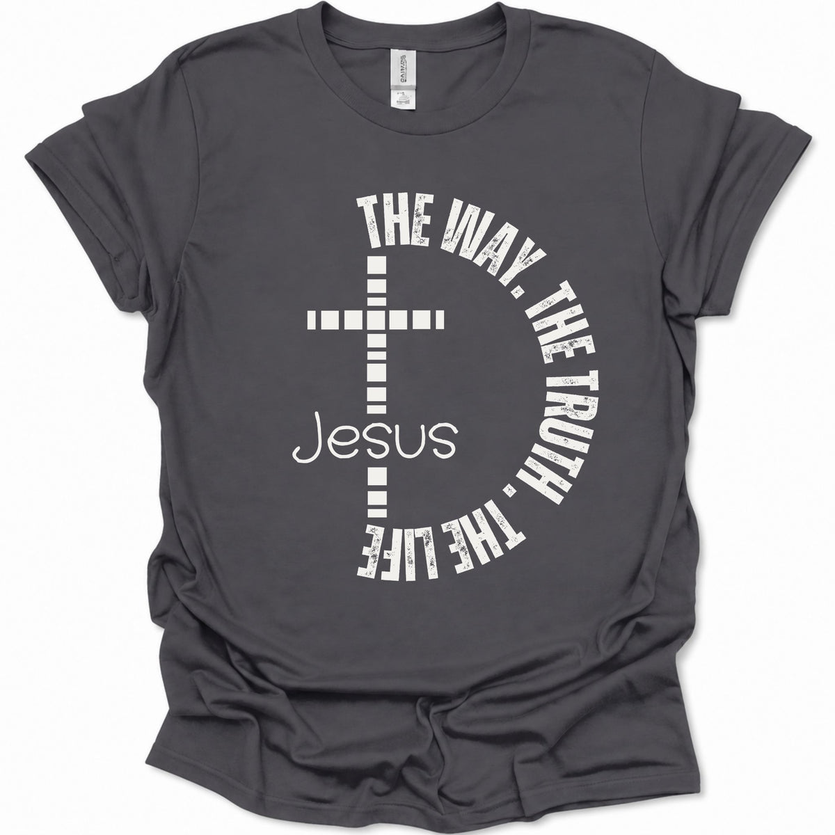 A dark gray short-sleeve t-shirt with a white graphic print on the front featuring a cross, the word 'Jesus', and the phrase 'THE WAY, THE TRUTH, THE LIFE' arranged in a circle.