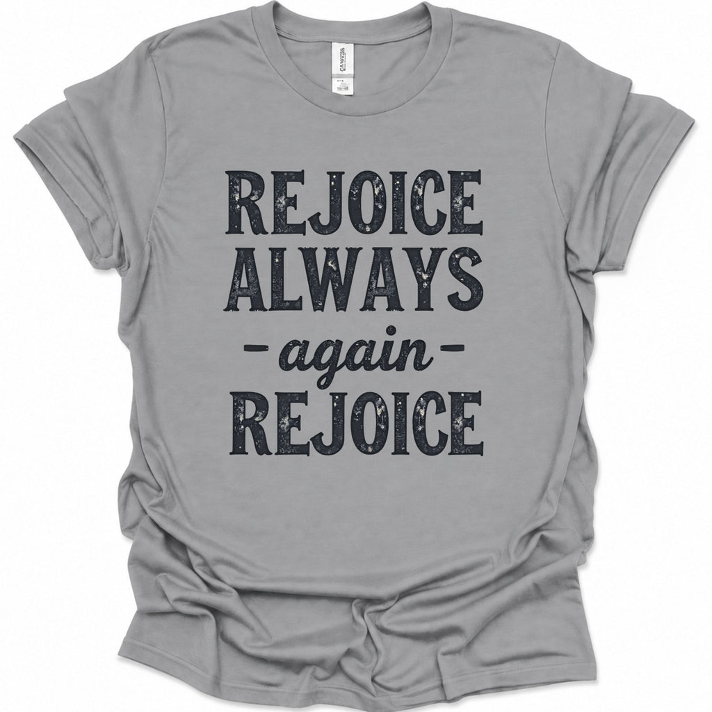 A sport gray short-sleeve t-shirt with a distressed black graphic print that reads 'REJOICE ALWAYS - again - REJOICE' on the front, displayed flat against a white background.