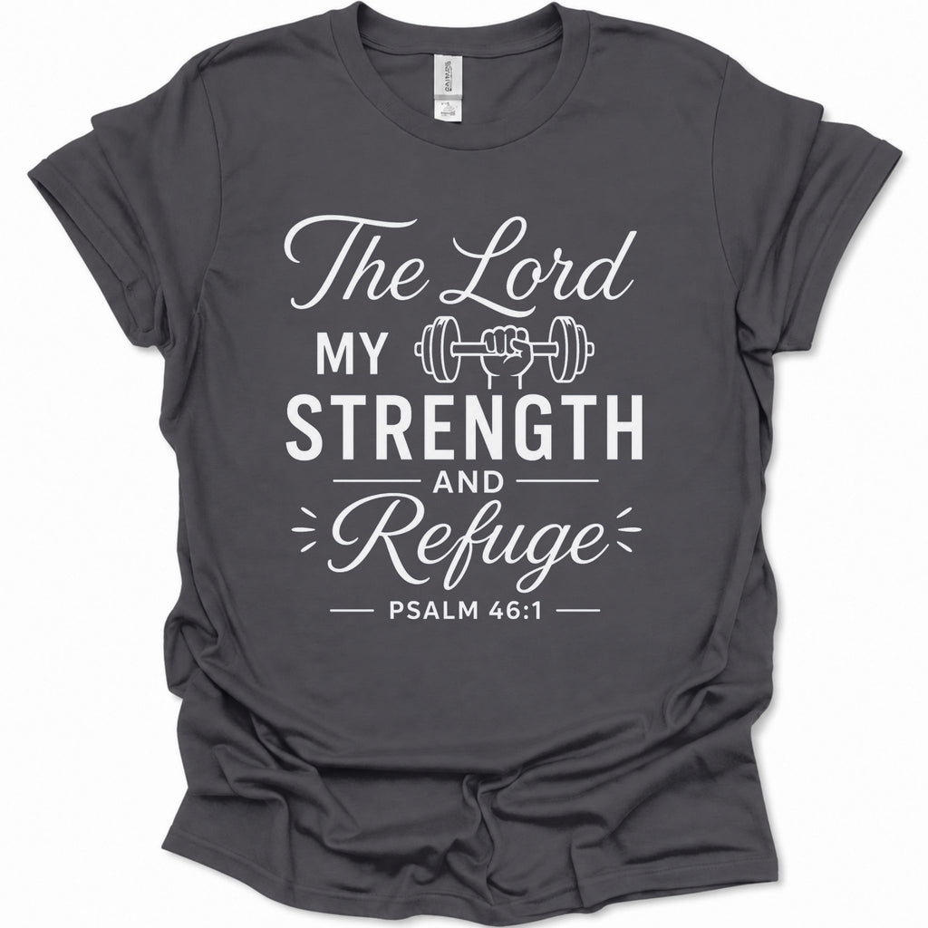 A dark heather gray short-sleeve t-shirt with a white graphic print on the front that reads 'The Lord MY STRENGTH AND Refuge PSALM 46:1' with a small barbell illustration, shown on a plain white background.