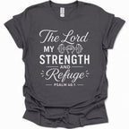 A dark heather gray short-sleeve t-shirt with a white graphic print on the front that reads 'The Lord MY STRENGTH AND Refuge PSALM 46:1' with a small barbell illustration, shown on a plain white background.