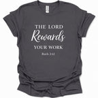 A dark heather gray short-sleeve t-shirt with white printed text reading 'THE LORD Rewards YOUR WORK Ruth 2:12' on the front, shown on a plain white background.