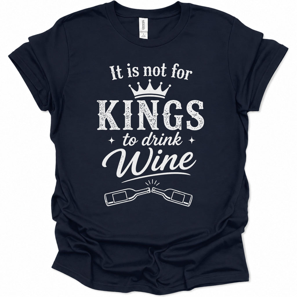 A navy blue short-sleeve t-shirt with a white graphic print that reads 'It is not for KINGS to drink Wine' with a crown and two wine bottles, shown on a plain white background.