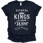 A navy blue short-sleeve t-shirt with a white graphic print that reads 'It is not for KINGS to drink Wine' with a crown and two wine bottles, shown on a plain white background.