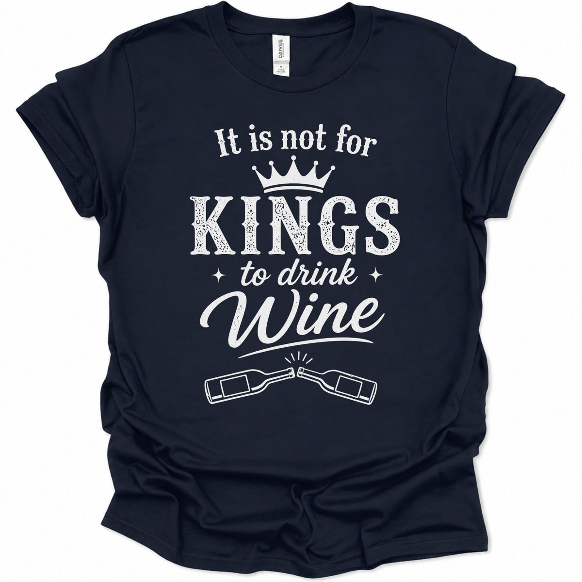 A navy blue short-sleeve t-shirt with a white graphic print that reads 'It is not for KINGS to drink Wine' with a crown and two wine bottles, shown on a plain white background.