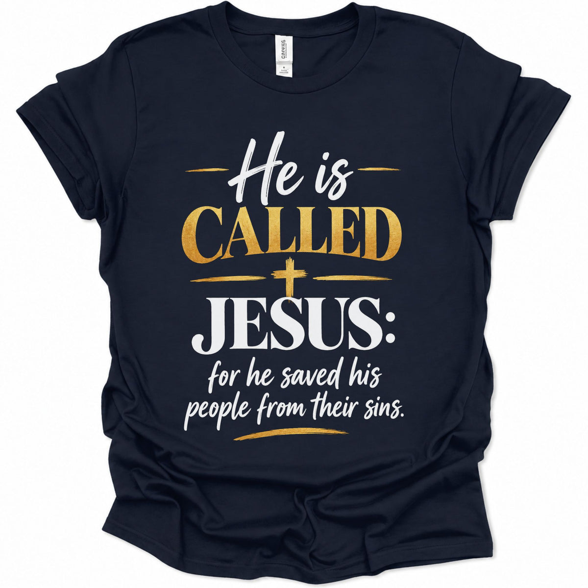 A navy blue short-sleeve t-shirt with a graphic print on the front that reads 'He is CALLED JESUS: for he saved his people from their sins.' in white and gold lettering, displayed on a clean white background.