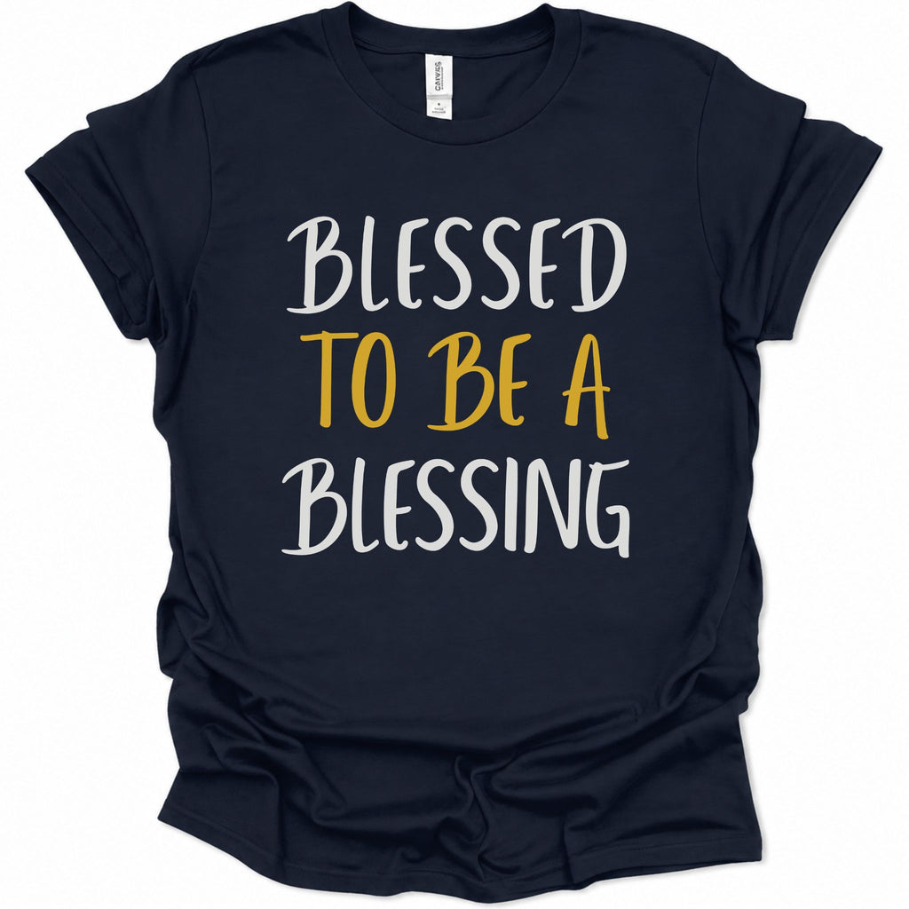 A navy blue short-sleeve t-shirt with the phrase 'BLESSED TO BE A BLESSING' printed on the front in white and mustard yellow lettering, displayed against a plain white background.