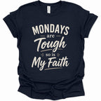 A navy blue short-sleeve t-shirt with a distressed white graphic text that reads 'MONDAYS are Tough so is My Faith' on a solid white background.