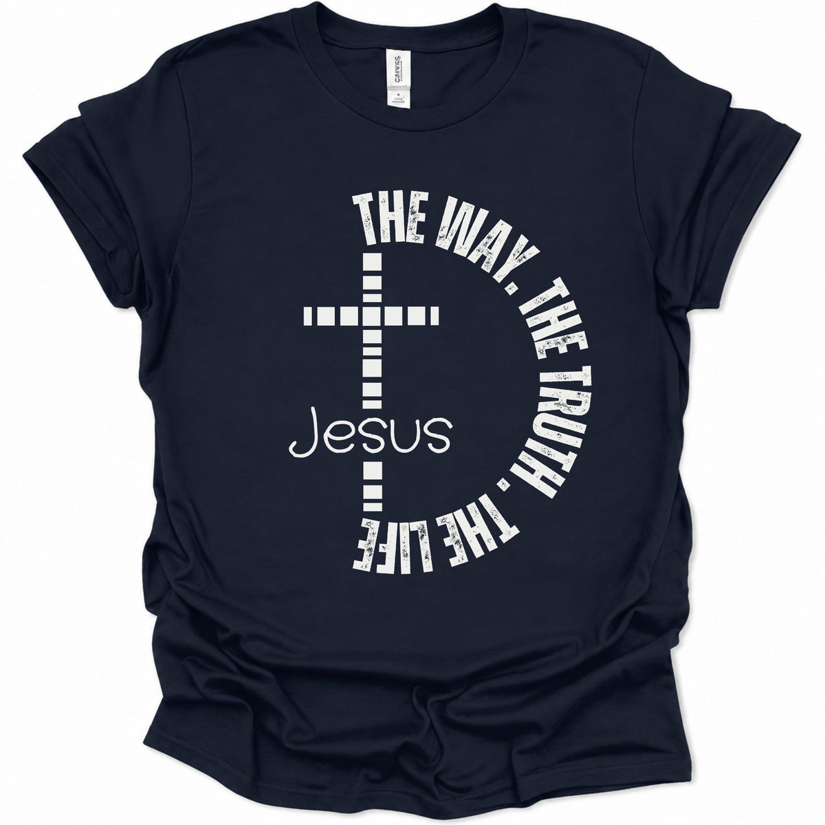 A navy blue short-sleeve t-shirt with a white graphic print on the front featuring a cross, the word 'Jesus', and the phrase 'THE WAY, THE TRUTH, THE LIFE' arranged in a circle.