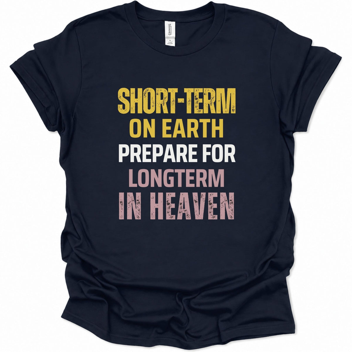 A navy blue short-sleeve t-shirt with a distressed typographic graphic on the front reading 'SHORT-TERM ON EARTH PREPARE FOR LONGTERM IN HEAVEN' in yellow, white, and pink lettering, shown on a plain white background.
