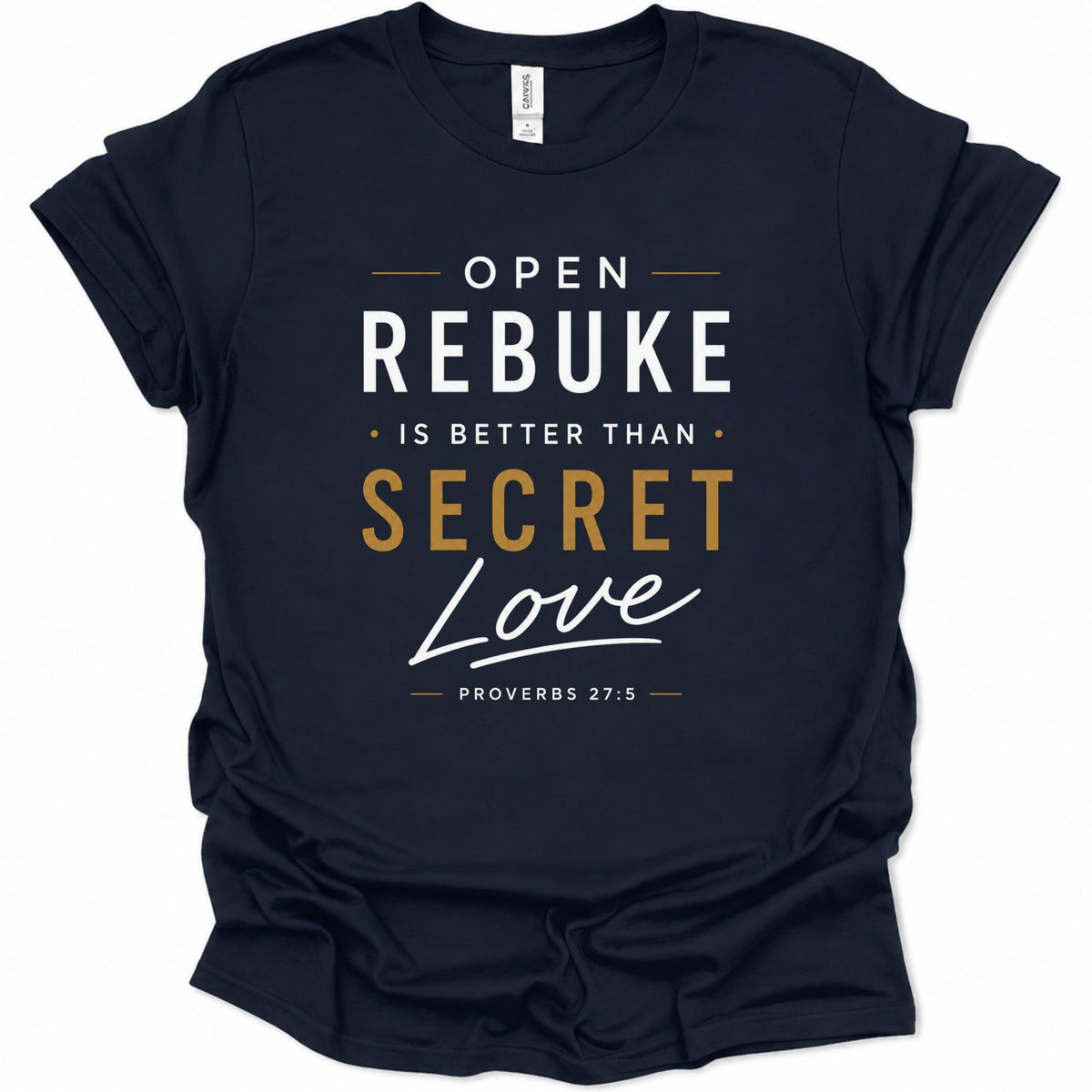 A navy blue short-sleeve t-shirt with a graphic print on the front reading 'OPEN REBUKE IS BETTER THAN SECRET Love' and 'PROVERBS 27:5' in white and gold lettering, shown on a plain white background.