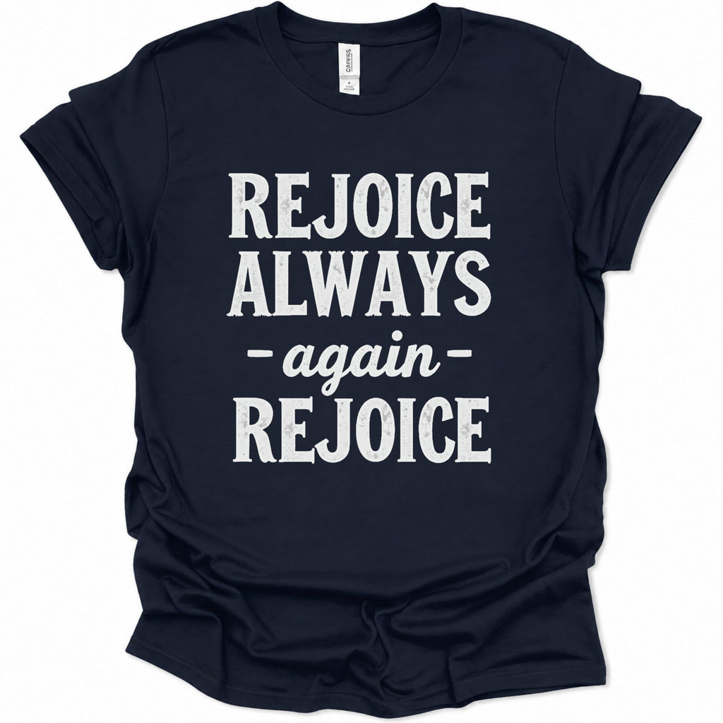 A navy blue short-sleeve t-shirt with the phrase 'REJOICE ALWAYS - again - REJOICE' printed in distressed white block letters on the front, displayed against a plain white background.
