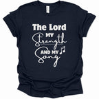 A navy blue short-sleeve t-shirt with a white graphic print on the front reading 'The Lord My Strength And My Song' with a music note symbol, shown on a plain white background.
