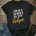 Black t-shirt with 'Holy Spirit is my Helper' text on a wooden surface with jeans and a Bible. Holy Spirit is My Helper Christian T-Shirt John 14:26 faith apparel Faith Forward