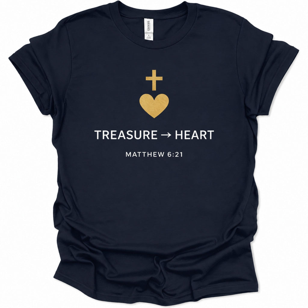 A navy blue short-sleeve t-shirt with a gold and white graphic on the chest featuring a cross, a heart, the text 'TREASURE -> HEART', and 'MATTHEW 6:21'.
