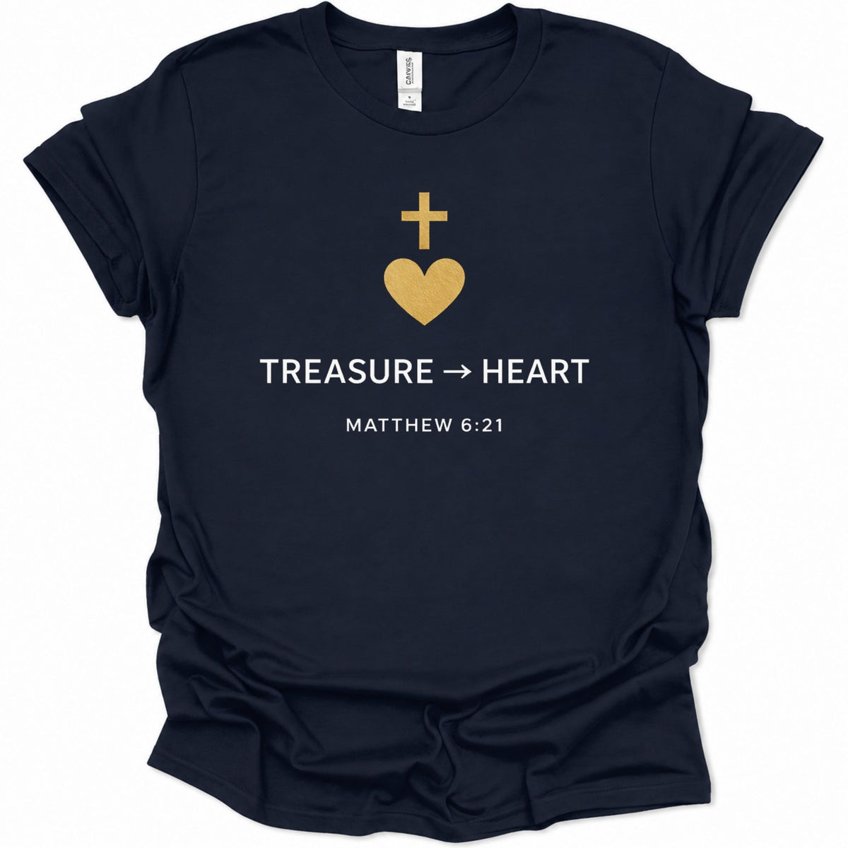 A navy blue short-sleeve t-shirt with a gold and white graphic on the chest featuring a cross, a heart, the text 'TREASURE -> HEART', and 'MATTHEW 6:21'.