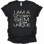 A black short-sleeve t-shirt with a white graphic text print reading 'I AM A Chosen GEM I AM UNIQUE' and a small yellow diamond icon, shown on a plain white background.
