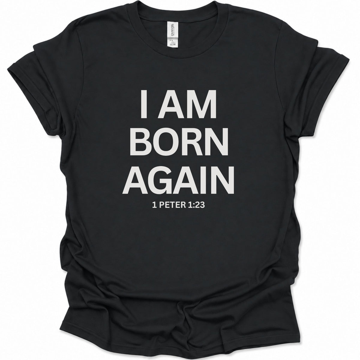 A black short-sleeve t-shirt with bold white text reading 'I AM BORN AGAIN' and '1 PETER 1:23' printed on the front, shown against a plain white background.