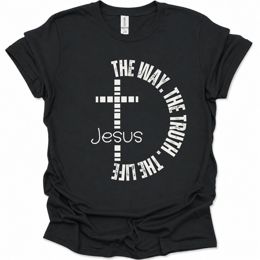 A black short-sleeve t-shirt with a white graphic print featuring a cross, the word 'Jesus', and the phrase 'THE WAY, THE TRUTH, THE LIFE' arranged in a circle.