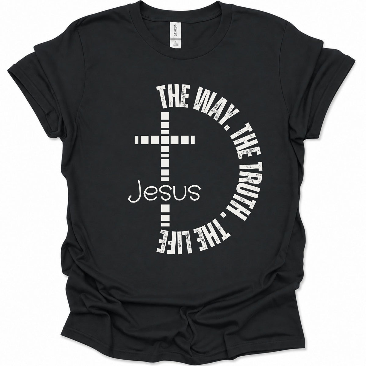 A black short-sleeve t-shirt with a white graphic print featuring a cross, the word 'Jesus', and the phrase 'THE WAY, THE TRUTH, THE LIFE' arranged in a circle.