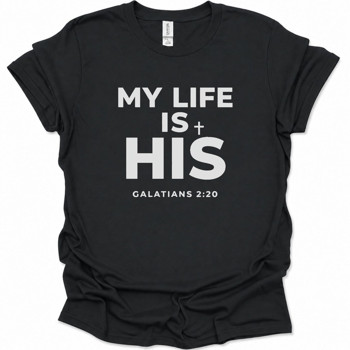 A black short-sleeve crewneck t-shirt with bold black text on the front reading 'MY LIFE IS + HIS' and 'GALATIANS 2:20' underneath, shown on a plain white background.