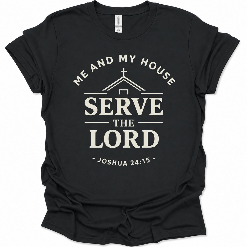 A black short-sleeve crewneck t-shirt with a cream-colored graphic print on the front. The graphic features a church silhouette, a cross, and the text 'ME AND MY HOUSE SERVE THE LORD - JOSHUA 24:15 -'.
