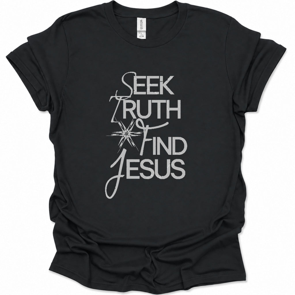 A black short-sleeve t-shirt with a white graphic print on the front reading 'SEEK TRUTH AND JESUS' in mixed serif and script fonts, displayed on a clean white background.