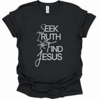 A black short-sleeve t-shirt with a white graphic print on the front reading 'SEEK TRUTH AND JESUS' in mixed serif and script fonts, displayed on a clean white background.