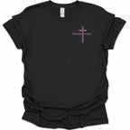 A black short-sleeve t-shirt with a small purple cross graphic and the word 'Redeemed' printed on the left chest, displayed on a clean white background.