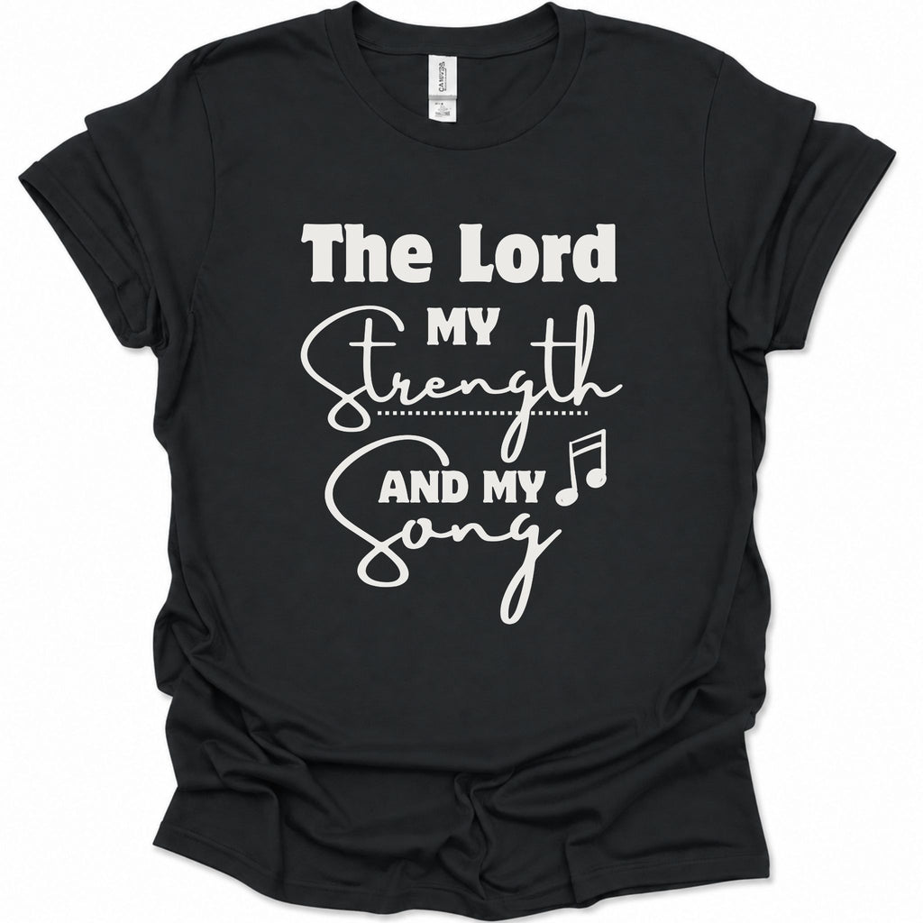 A black short-sleeve t-shirt with a white graphic print on the front reading 'The Lord My Strength And My Song' with a music note symbol, shown on a plain white background.