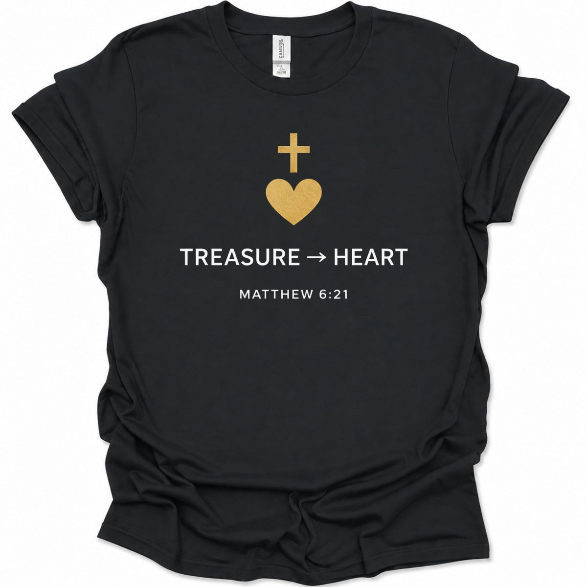 A black short-sleeve t-shirt with a gold and white graphic on the chest featuring a cross, a heart, the word 'TREASURE', an arrow, 'HEART', and 'MATTHEW 6:21'.