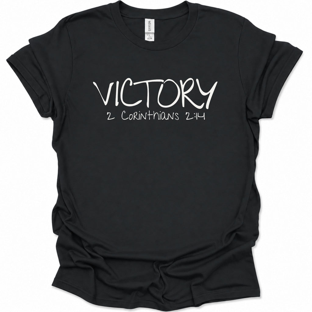 A black short-sleeve t-shirt with 'VICTORY 2 CORINTHIANS 2:14' printed in white across the chest, displayed flat against a white background.