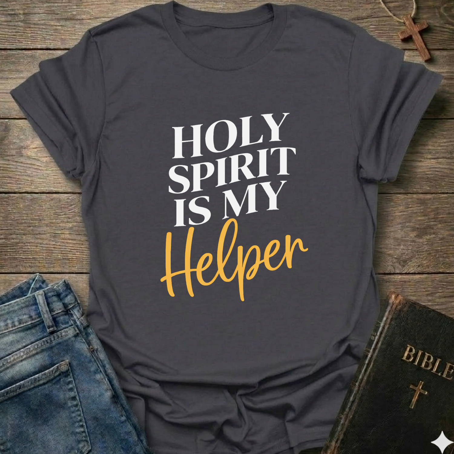 Gray t-shirt with 'Holy Spirit is my Helper' text on a wooden surface with jeans and a Bible. Holy Spirit is My Helper Christian T-Shirt John 14:26 faith apparel Faith Forward